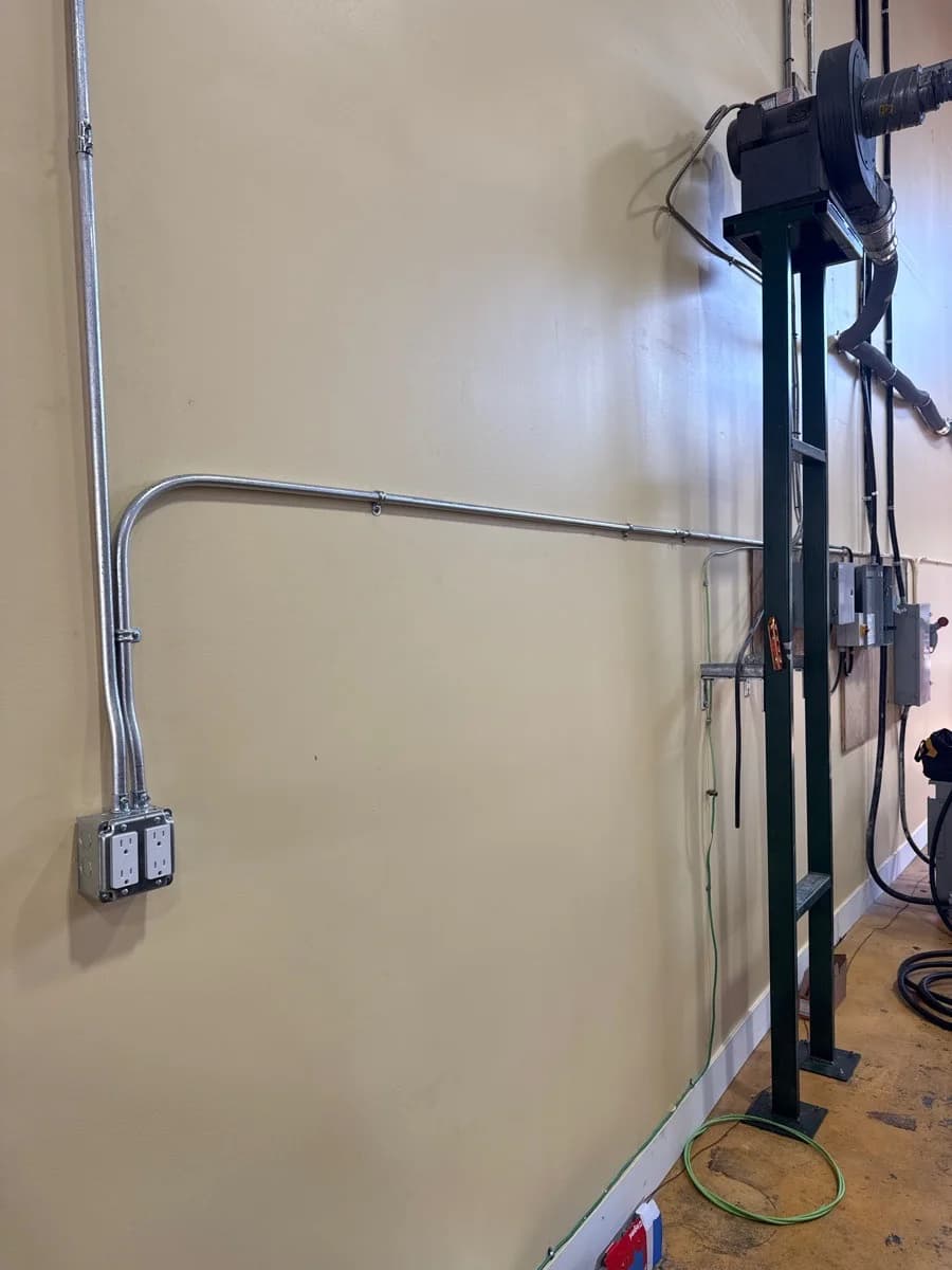 Completed conduit pathway and receptacle installation