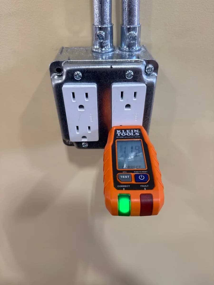 New receptacles tested with a plug-in electrical tester