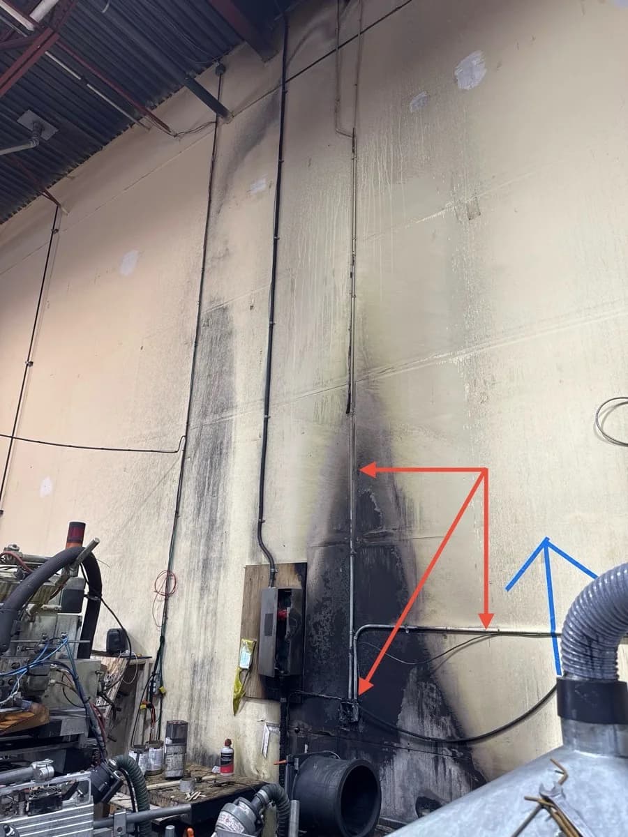 Fire-affected wall and documented electrical repair path